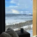 Family With Picturesque View At *